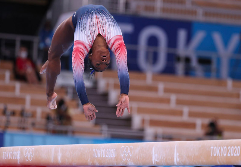 Olympian Simone Biles on balance beam